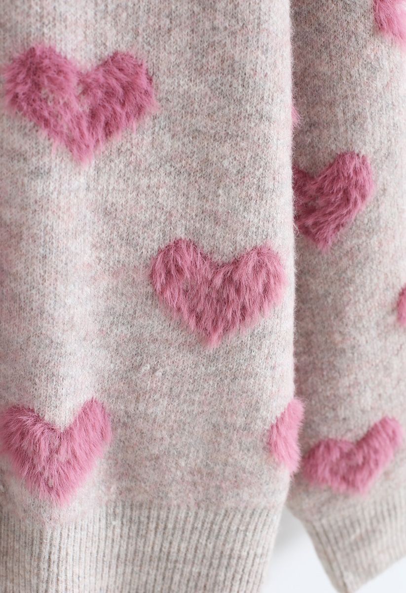 Jersey de punto con corazones borrosos en contraste de colores