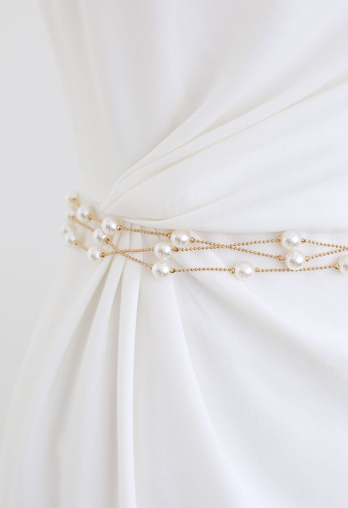 Cinturón de cadena de oro con capas de perlas