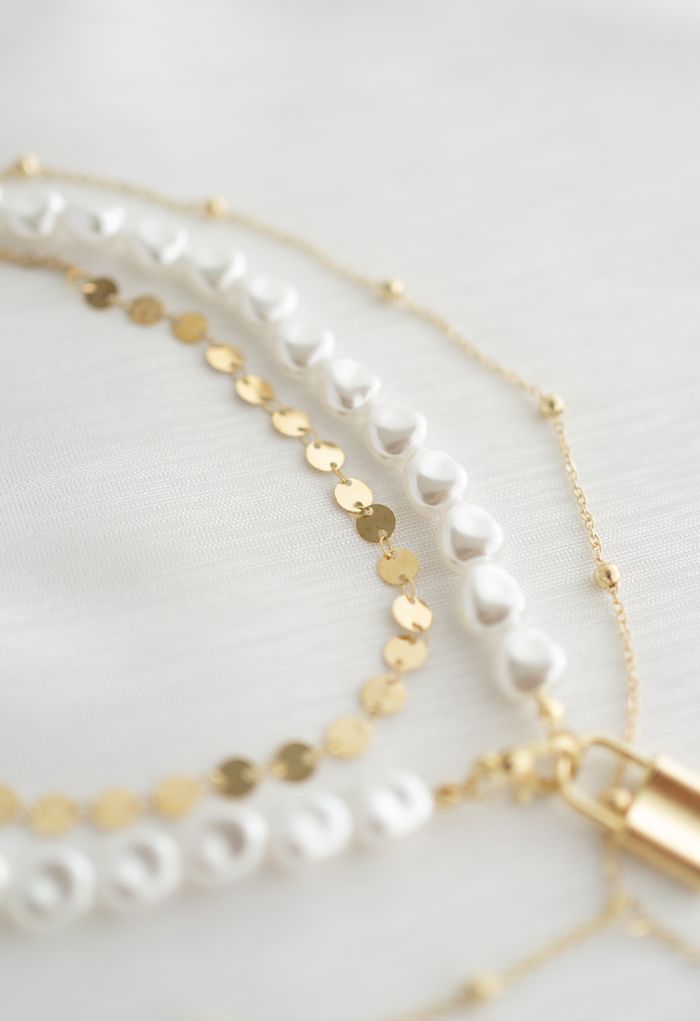 Collar de candado de oro con perla de varias capas