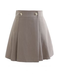 Minifalda plisada con solapa estilo preppy