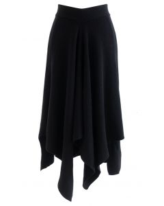 Falda midi de punto con dobladillo asimétrico en negro de Sencillez