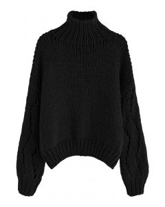Suéter tejido a mano con cuello alto y manga pointelle en negro