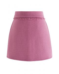 Minifalda de tweed con ribete de flecos en rosa