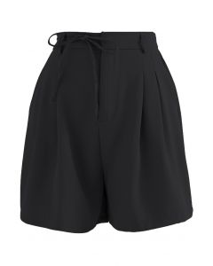 Shorts con bolsillo lateral con tiras que se atan en negro