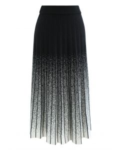 Falda de punto plisada con puntos densos en negro