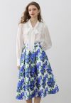 Falda midi plisada con estampado floral azul