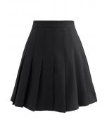 Minifalda plisada de cintura alta en negro
