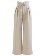 Pantalones anchos con cintura anudada con o-ring en color arena