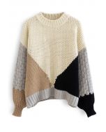 Suéter grueso tejido a mano con bloques de color en tostado claro