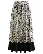 Falda de punto plisada con dobladillo en contraste en negro