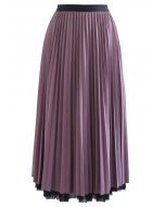 Falda plisada de malla con ribete de rombos reversible en lila