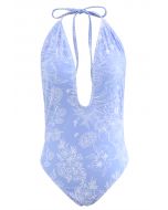 Bañador floral con espalda abierta y dibujo floral en azul