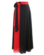 Falda larga cruzada empalmada con cintura anudada en rojo