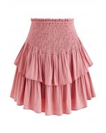 Minifalda con cintura fruncida y volantes escalonados en rosa