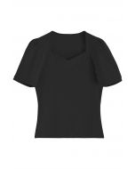 Camiseta con escote cuadrado y hombros abullonados en negro