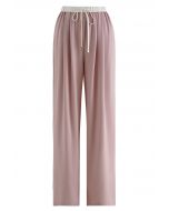 Pantalones de pierna recta plisados de raso con cintura en contraste en rosa