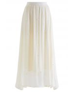 Falda de chifón brillante con perlas irregulares en color crema