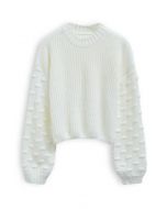 Suéter corto con mangas abullonadas y puntos juguetones en blanco