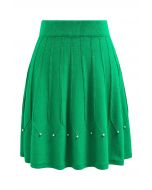 Falda de punto con costuras adornadas con cuentas plateadas en verde
