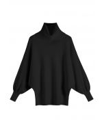 Suéter de canalé con mangas de murciélago y cuello alto en negro