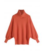 Suéter de canalé con mangas de murciélago y cuello alto en naranja