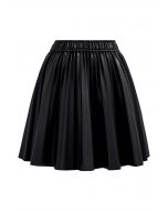 Minifalda plisada de piel sintética en negro