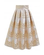 Magnífica falda midi plisada de jacquard floral en champán