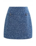 Minifalda de tweed con botones de varios colores en azul
