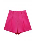 Pantalones cortos plisados en mezcla de lino con bolsillo lateral en rosa fuerte