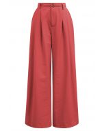 Pantalones anchos con detalle de pinzas en rojo