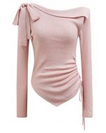 Blusa de punto con cordón ajustable en la cintura y decoración con lazo lateral en color rosa