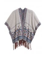 Poncho de punto con flecos Boho Wanderer en color marfil