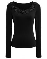 Blusa ajustada de manga larga con escote de flores 3D en color negro