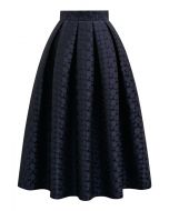 Falda midi plisada de jacquard con lunares llamativos