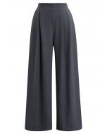 Pantalones palazzo con pliegues y botones, de estilo elegante y sencillo, en gris