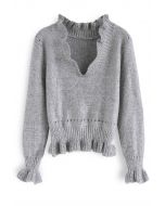 Tejer un suéter con volantes con cuello en V Chance en gris